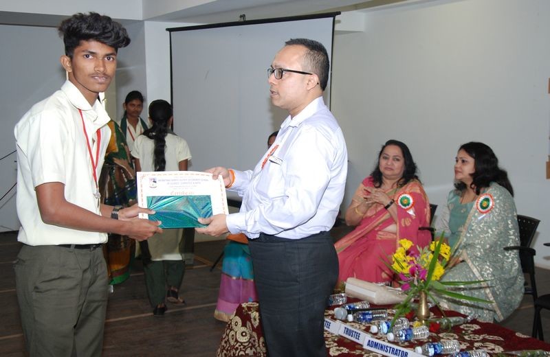 Student Mast. Touseef Buddanavar seen receiving a certificate at the hands of the Chief Guest of the Cultural Prize Distribution Ceremony, Mr. Yatish Dempo, Trustee of Dempo Charities Trust.
